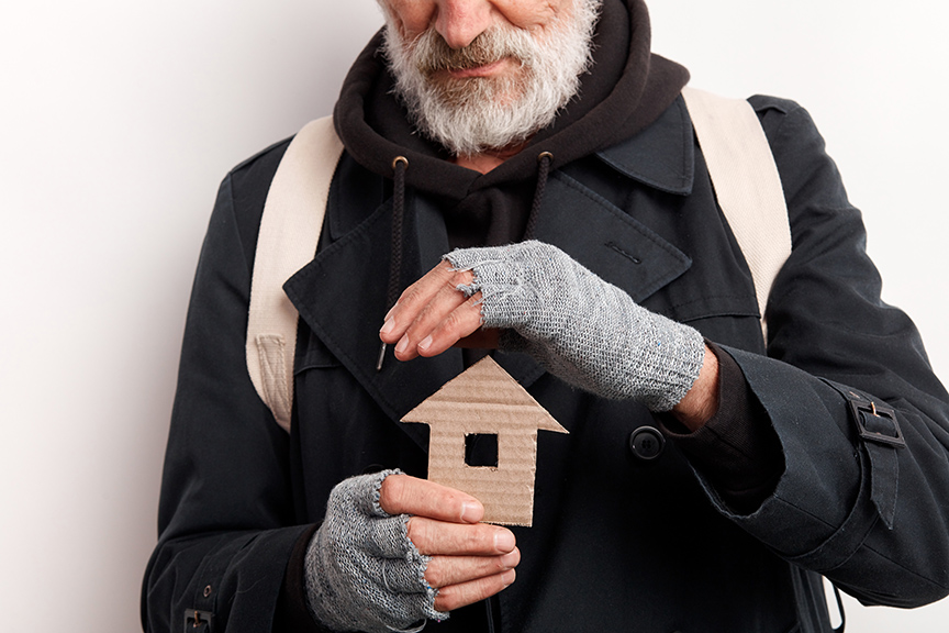 Mature bearded homeless man dream about home